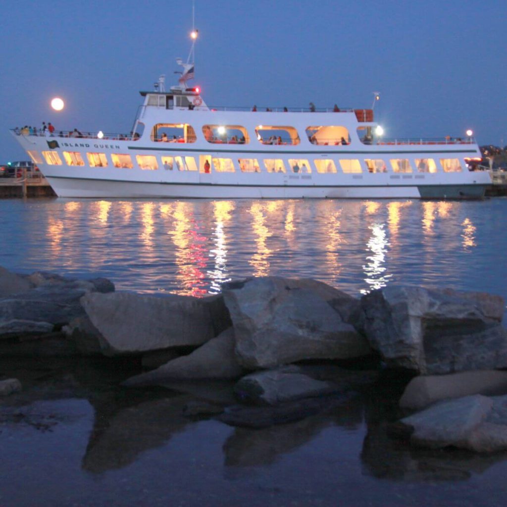 Photo of the Island Queen ferry in docked in Martha's Vineyard at night.