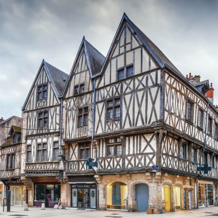 Photo of the town of Dijon in France showcasiing medieval era half-timbered houses.