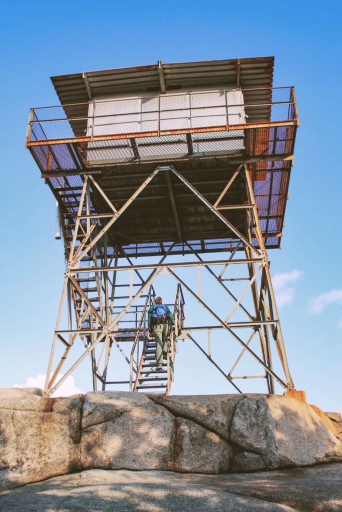 Photo of the fire tower at the summit of Beech Mountain in Maine.