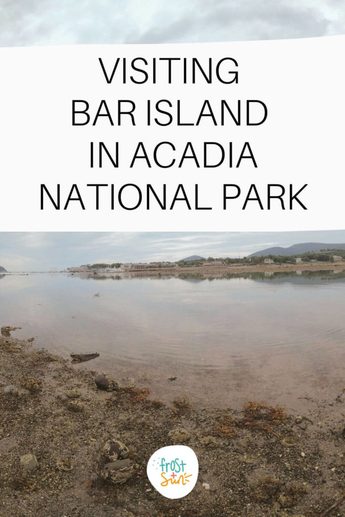 Photo from shoreline of Bar Island looking out toward the shoreline of Mount Desert Island and downtown Bar Harbor, Maine. Text overlay reads "Visiting Bar Island in Acadia National Park."