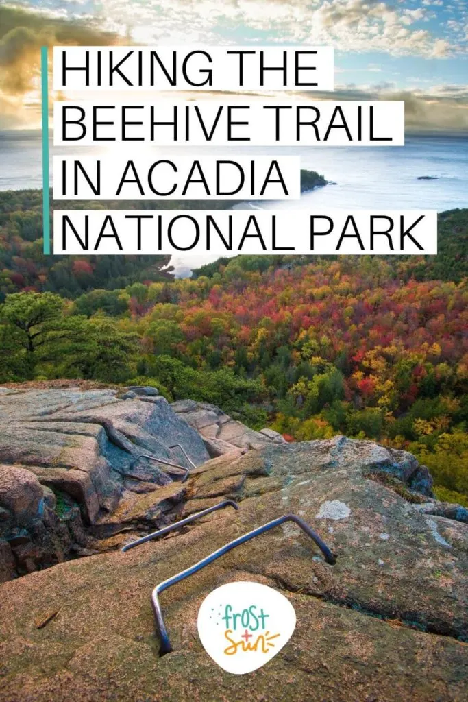 Photo of the view from atop Beehive with Fall foliage and the Gulf of Maine below. Text overlay reads "Hiking the Beehive Trail in Acadia National Park."