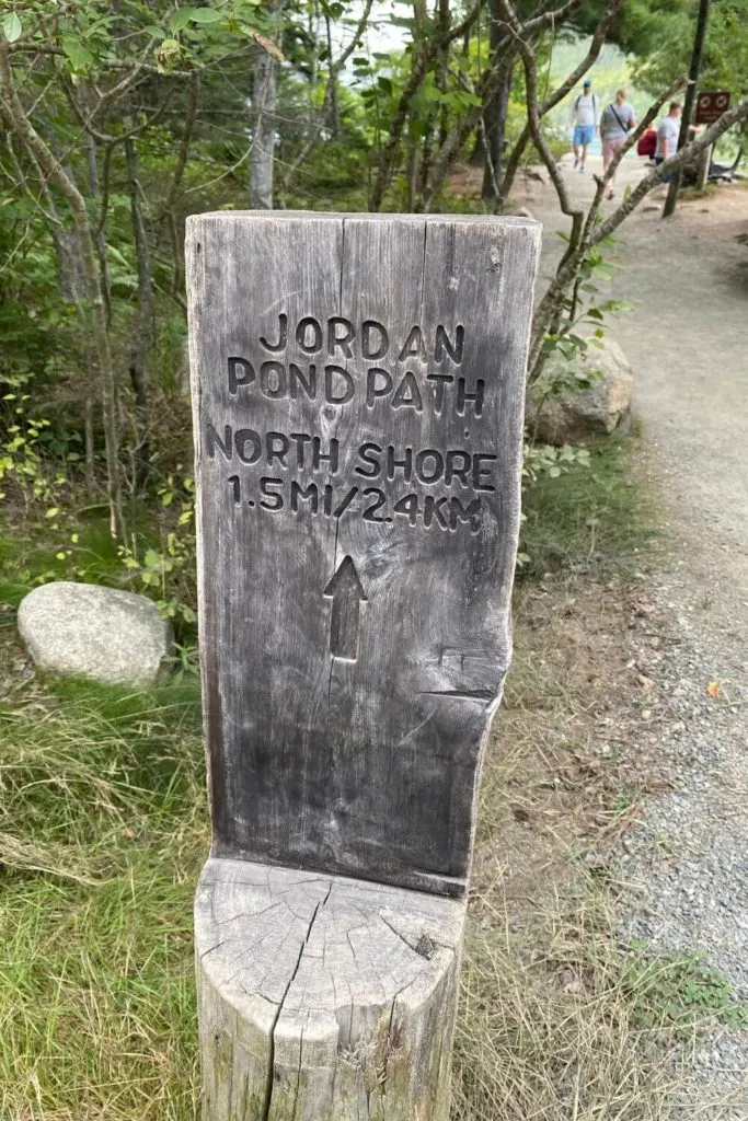 Photo of the wooden trail marker for the Jordan Pond Path in Acadia National Park.