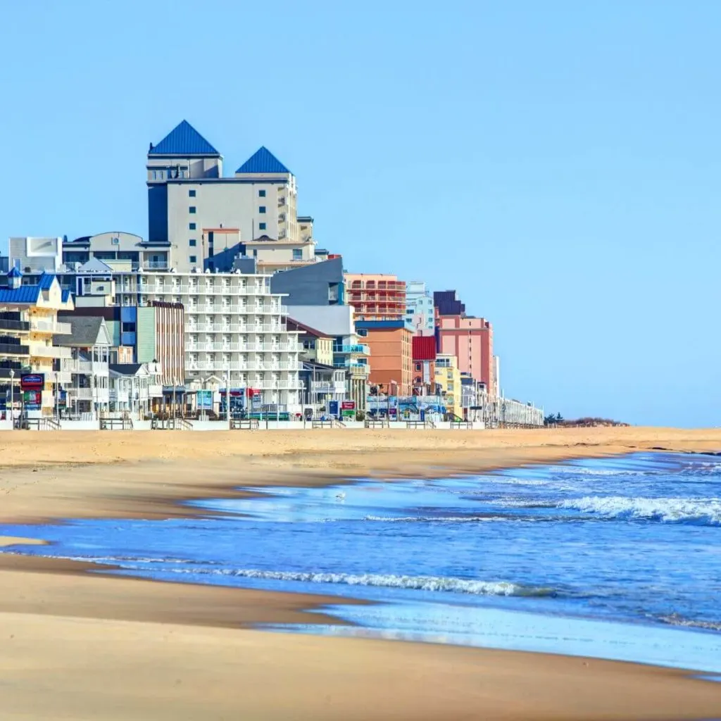Photo of Ocean City Beach in Maryland with hotels along the beach in the background.