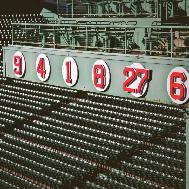 Closeup photo of part of the Green Monster wall at Fenway Park.
