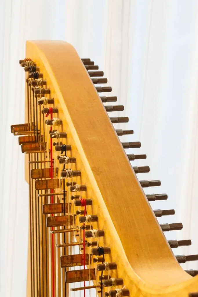 Closeup of the top of a Celtic harp.