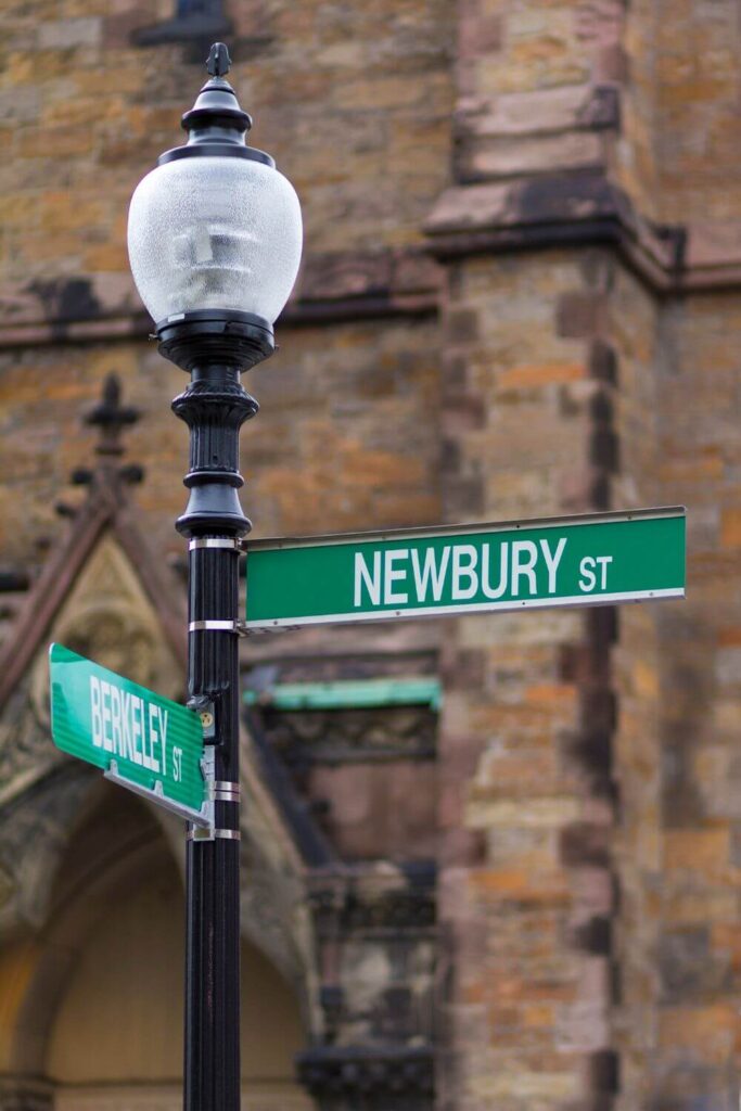 Photo of a street sign at Newbury and Berkeley streets in Boston.